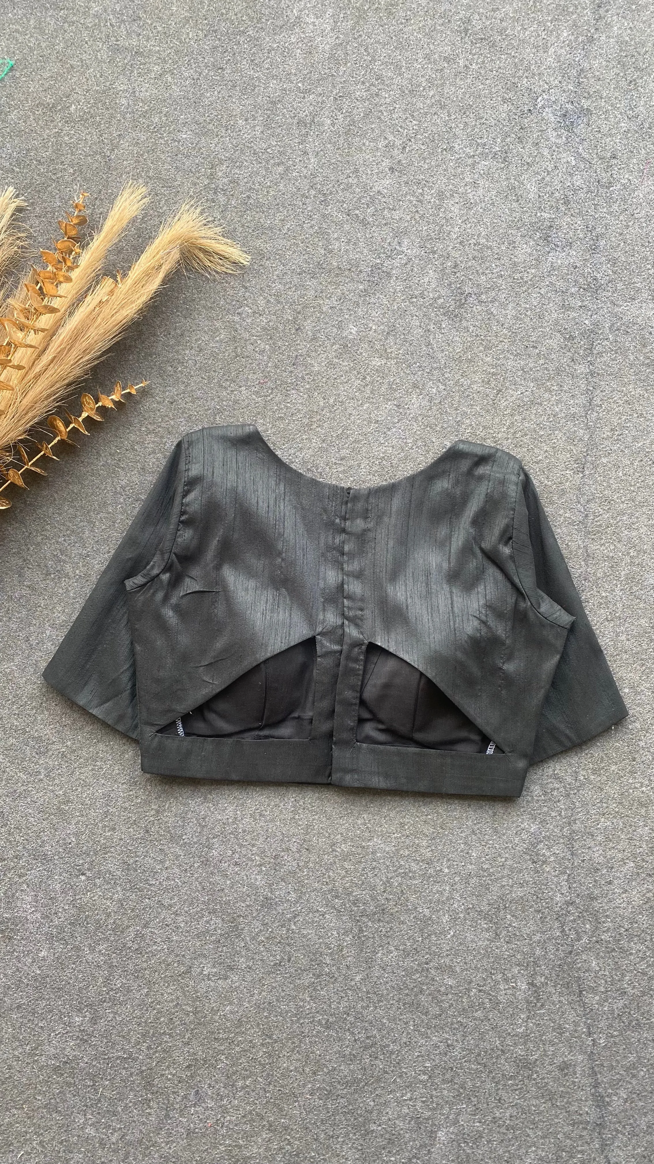 Black silk V neck patterned blouse